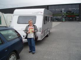 A smiling and very happy Else with her new caravan, when we picked it up at the dealer's.
